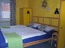 Schlafzimmer in der Sonnenblumenwohnung Atelier am Markt in Hermannsburg